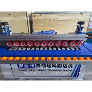 Máy dán cạnh DW590 3 chức năng  ( dán, cắt chỉ khi hết ván, tự động đẩy phôi. Dán thẳng, cong, vát 45 )