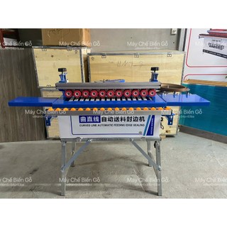 Máy dán cạnh DW590 3 chức năng  ( dán, cắt chỉ khi hết ván, tự động đẩy phôi. Dán thẳng, cong, vát 45 )