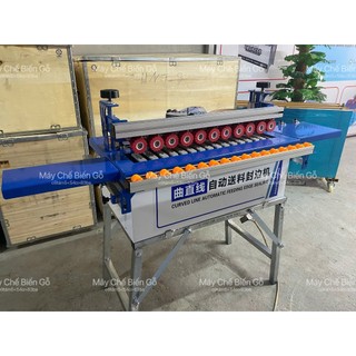 Máy dán cạnh DW590 3 chức năng  ( dán, cắt chỉ khi hết ván, tự động đẩy phôi. Dán thẳng, cong, vát 45 )