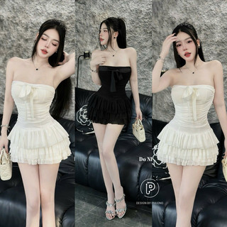 Đầm quây nhún lưới đính nơ chân tầng dáng ngắn