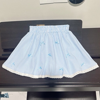 Chân váy dáng xoè lưng thun đính nơ vải sọc Chân váy đính nơ xờ lưng thun siêu xinh tiêu thư CHÂN VÁY XOÈ SỌC NƠ XANH