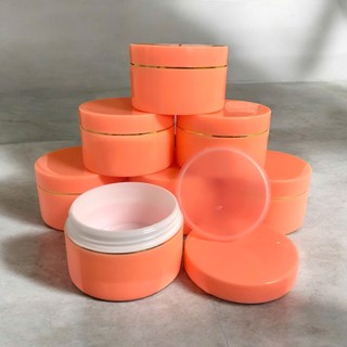 Hủ k100 : màu cam đào . Lòng kem 100g + hủ 150g