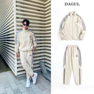 Bộ gió DAGUL nam nữ phối viền, lót lưới, logo thêu, túi quần và túi áo có dây kéo khóa, cản gió và đi được mưa nhỏ - Men