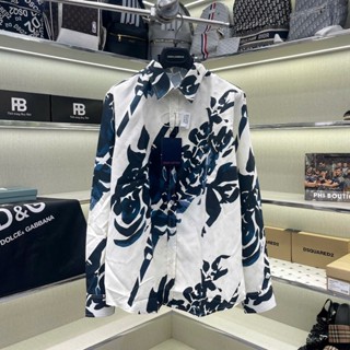 Áo sơ mi trắng nam dài tay Eo Vì in hoạ tiết vân hoa chữ monogram phối hoa văn loang xanh boy phố SM157P