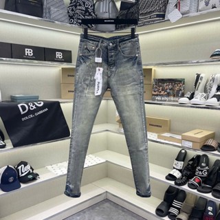 Quần jean nam Purple xanh bụi vàng trơn cào xước đùi dập nhăn ống mác lụa 4 cúc QJ597P