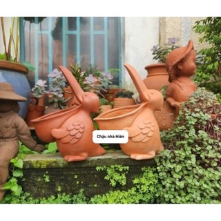 Chậu thú đất nung - chậu chim bồ nông