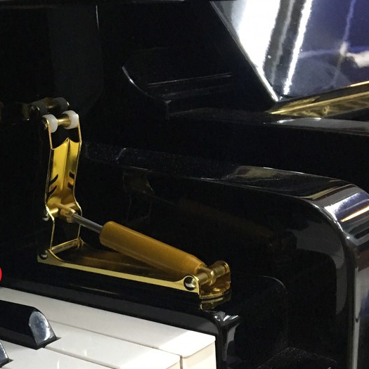 Dụng cụ chống sập nắp đàn piano