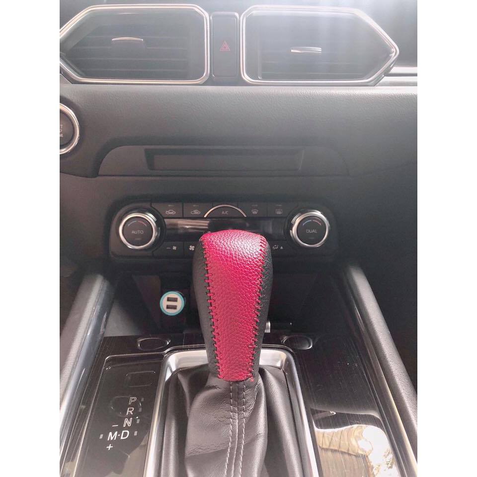 Bọc cần số da Bò xe Mazda 2, Mazda 3, Mazda 6, CX5, CX8, BT50 có lẫy bóp phía trước....