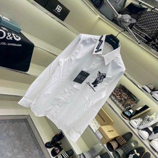 Áo sơ mi nam dài tay Đôn Chề lụa thêu hình cao bồi ngực phối cổ thêu logo SM161P