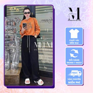 Set đồ nữ áo sweater in hình màu cam phối quần dài đen ống rộng có dây rút phong cách trẻ trung Meistore ST15572