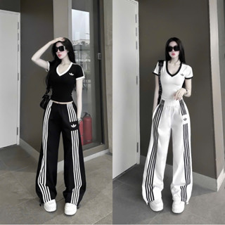 set cộc tay Da.. cổ tim cùng quần ống xuông chạy sọc