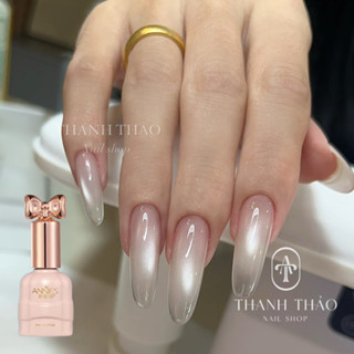 Sơn gel mắt mèo Annies ánh nước trong veo chai hồng M01