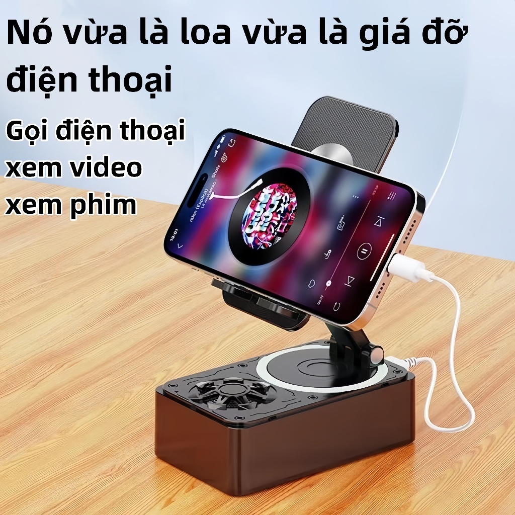Loa Bluetooth kèm giá đỡ điện thoại di động 3 trong 1 tích hợp sạc dư phòng chống trượt có thể gập lại thuận tiện.