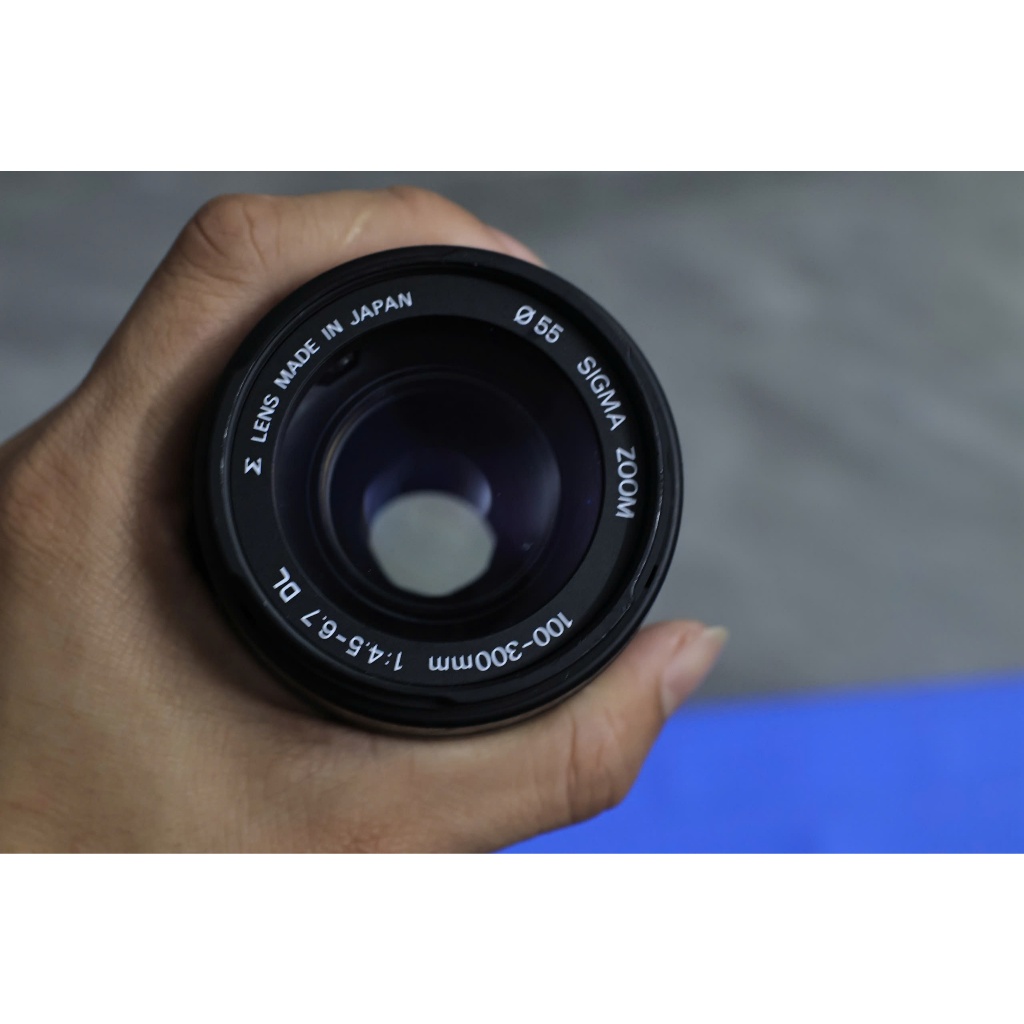 Sigma 100-300 f:4.5-6.7 DL for Canon ef  (te tua do bị rơi, kính còn đẹp) dành cho người có đam mê - Ống kính Canon EF