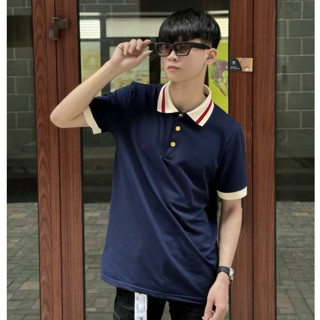 Áo polo nam cổ bẻ G.C cotton gai cá sấu xanh than trơn phối cổ chun dệt sọc be đỏ cúc vàng cao cấp 2025