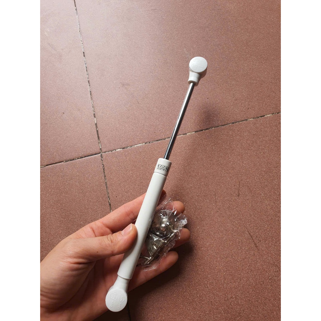 Piston chống cánh tủ