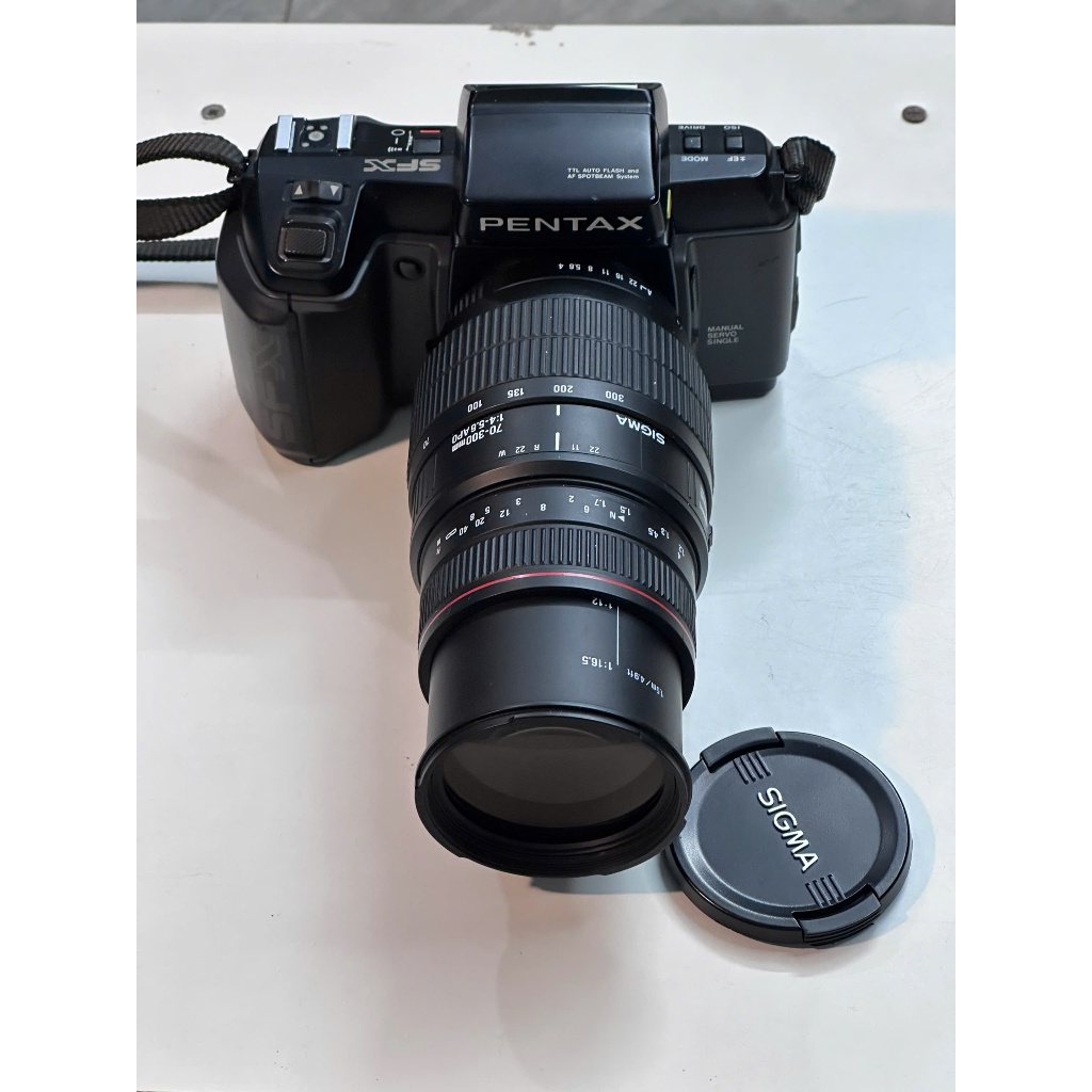 Máy ảnh phim Pentax SFX + lens sigma 70-300mm APO (Ngoài hình mới đẹp - hoạt động tốt) Bảo hành 3 tháng - Ống kính pentax