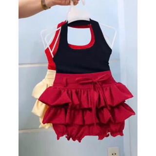 Sét quần váy hai tầng, áo cổ liền hở lưng cho bé gái,size:7/26kg
