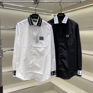 Áo sơ mi nam dài tay DG vải lụa nến thêu logo da tag sắt ngực phối bo chun ống dệt chữ sắc nét