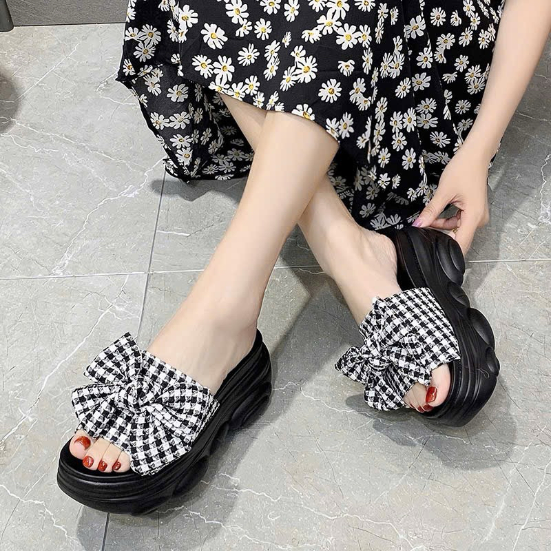 Dép nơ . cao 9cm . chất liệu nơ vải . màu đen .hàng quang châu chất lượng, đế đi êm vững chắc chân.