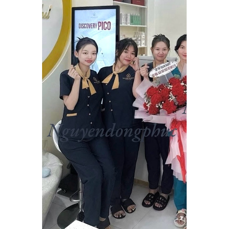Đồng phục spa màu đen viền vàng