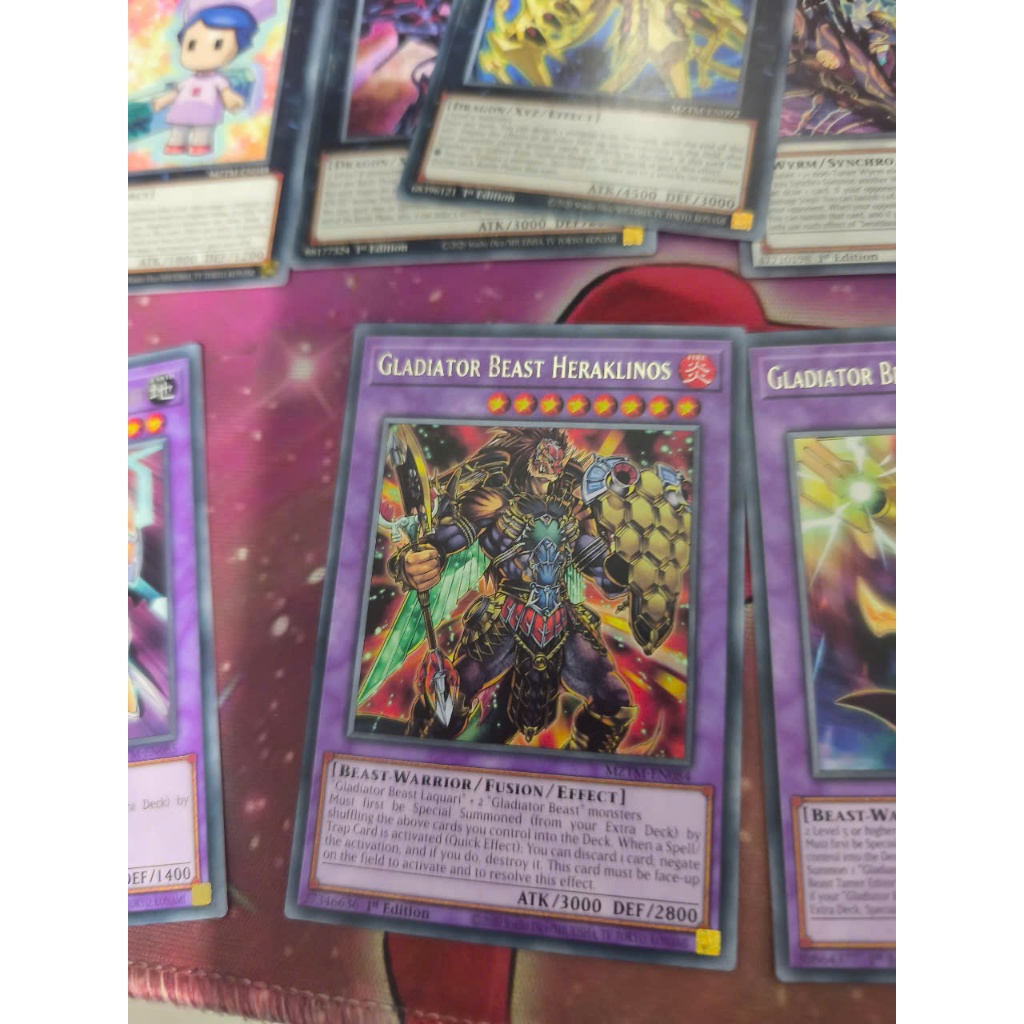 [YFS] 1 thẻ bài PKM/Yugioh TCG Gladiator Beast Heraklinos - MZTM-EN084 - Rare 1st Edition