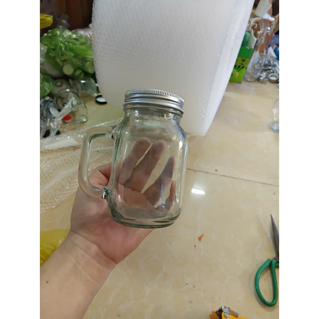 LY CÓ QUAI VÀ NẮP CÓ LỖ 650ML