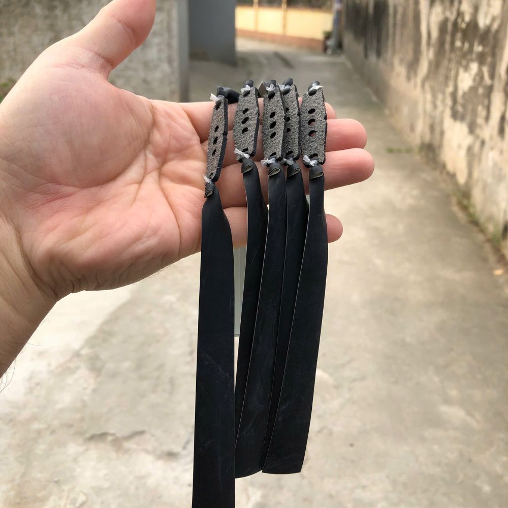 Dây thun ná cao su,COMBO 3-5-10 màu đen - trắng 0,65 kéo tới má