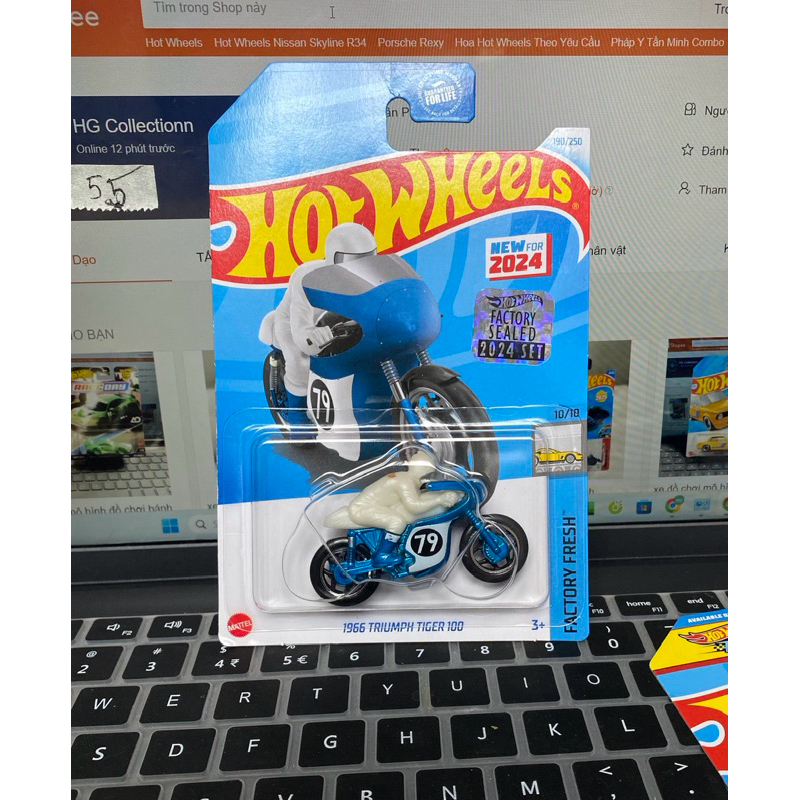 Xe mô hình đồ chơi Hot Wheels Basic 2024 Factory sealed: 1966 trumph tiger 100
