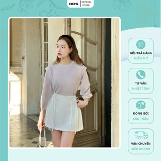 Chân Váy Chữ A Trắng Ngắn ODS thiết kế quần trong, xếp ly dọc 2 bên, nơ eo, dây kéo sau trẻ trung, năng động - DD11