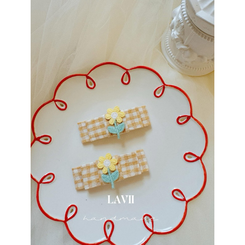 Kẹp mái caro hoa vàng cho bé 1 chiếc. Sansan
