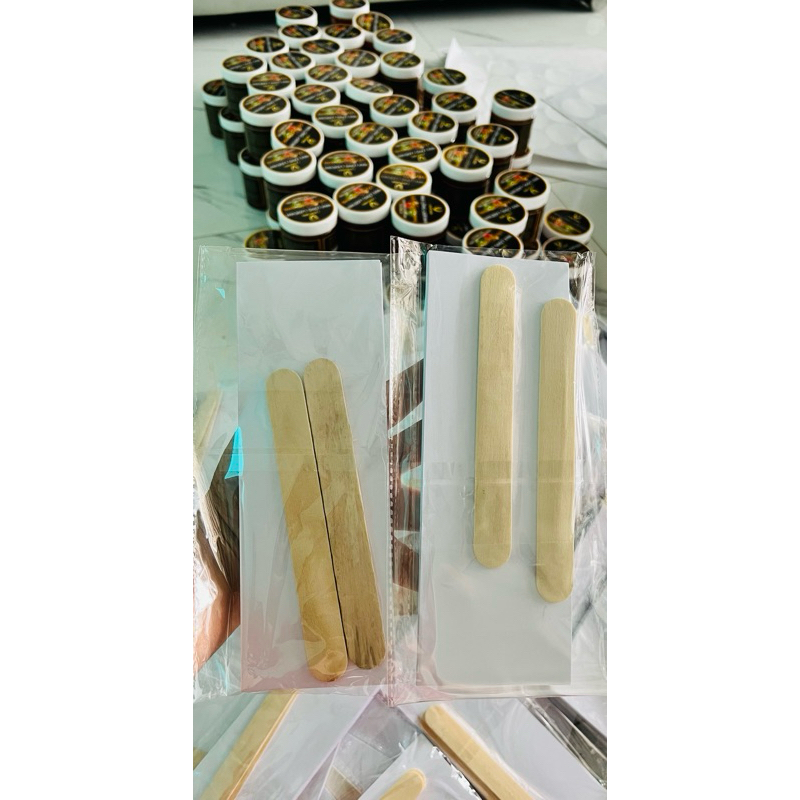 bọc 50giấy wax và 2 que gỗ
