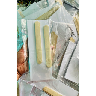 bọc 50giấy wax và 2 que gỗ