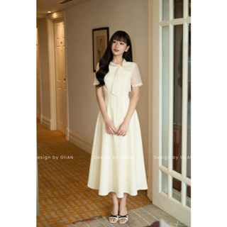 Váy xòe dáng dài Giian thiết kế cổ lệch thắt nơ cách điệu phối tay tơ vải tuyết mưa cao cấp VA1592