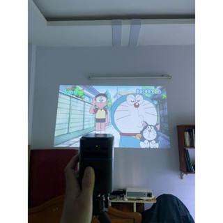 máy chiếu mini di động xem YouTube