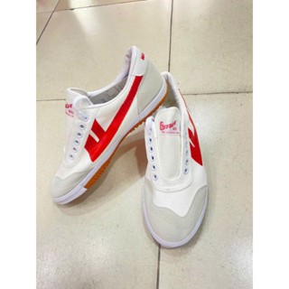 giày bata đá bóng chính hãng warrior