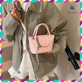 Túi xách nữ, đeo chéo mini kèm charm làm bằng da Pu trơn cao cấp