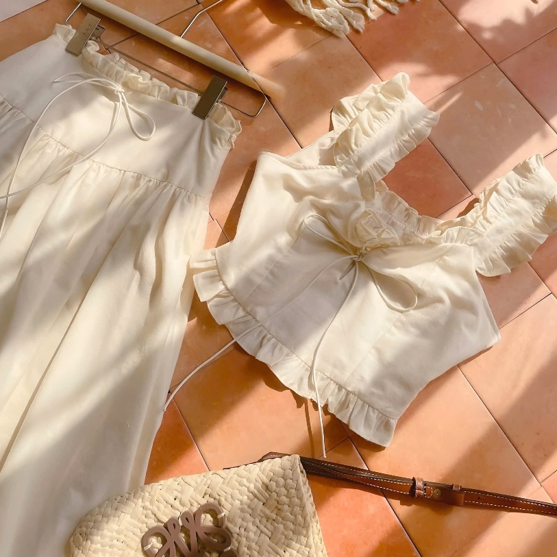 Set Áo Croptop 2 Dây Nude Phối Viền Bèo Cột Nơ Nguc + Chân Váy Midi Dáng Dài Chất Liệu Thô | BigBuy360 - bigbuy360.vn