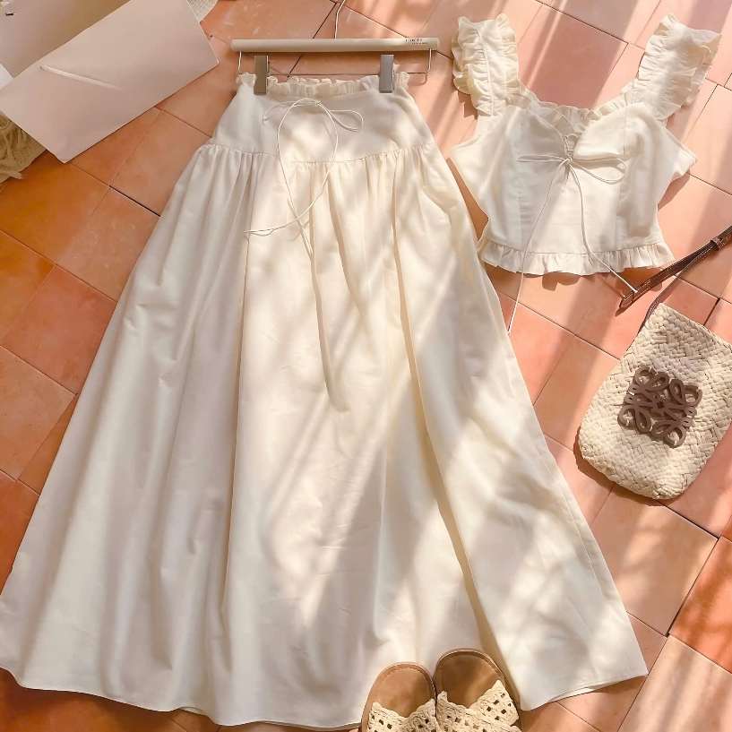 Set Áo Croptop 2 Dây Nude Phối Viền Bèo Cột Nơ Nguc + Chân Váy Midi Dáng Dài Chất Liệu Thô | BigBuy360 - bigbuy360.vn