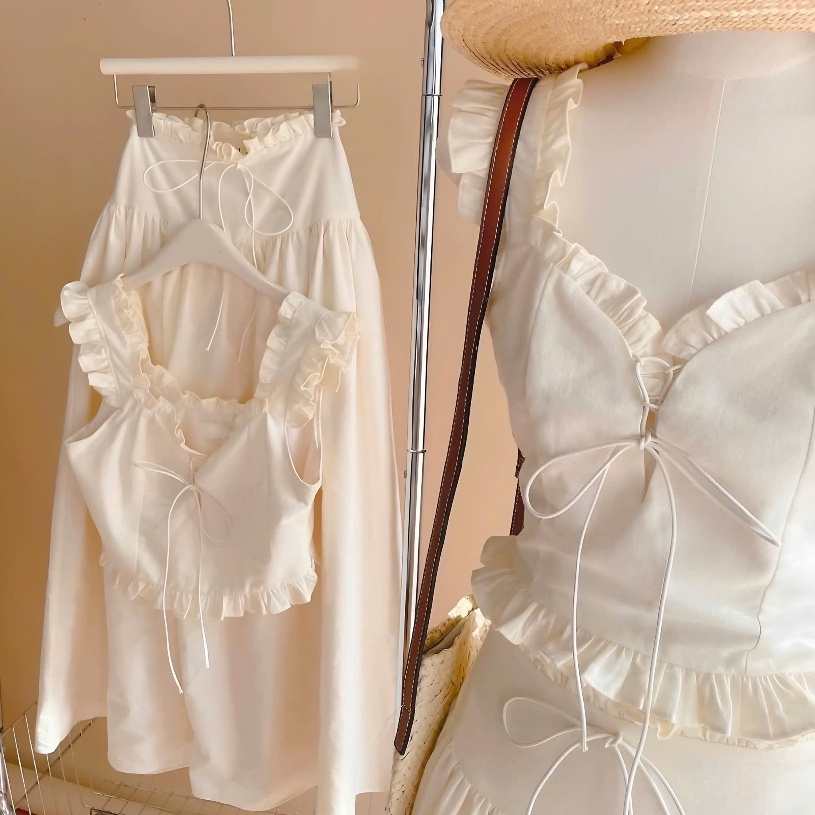Set Áo Croptop 2 Dây Nude Phối Viền Bèo Cột Nơ Nguc + Chân Váy Midi Dáng Dài Chất Liệu Thô | BigBuy360 - bigbuy360.vn