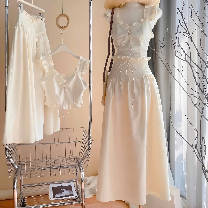 Set Áo Croptop 2 Dây Nude Phối Viền Bèo Cột Nơ Nguc + Chân Váy Midi Dáng Dài Chất Liệu Thô | BigBuy360 - bigbuy360.vn