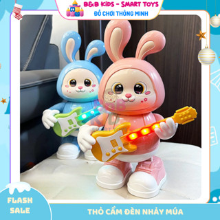 (Tặng Pin) Đồ chơi thỏ cầm hoa cầm đàn nhảy múa có đèn có nhạc di chuyển vui nhộn cho bé