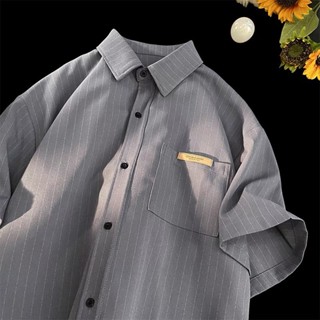 Áo sơ mi cộc tay nam nữ kẻ sọc nhẹ, 2 màu ghi trắng hottrend có logo ở túi trước, designed by X.STORE