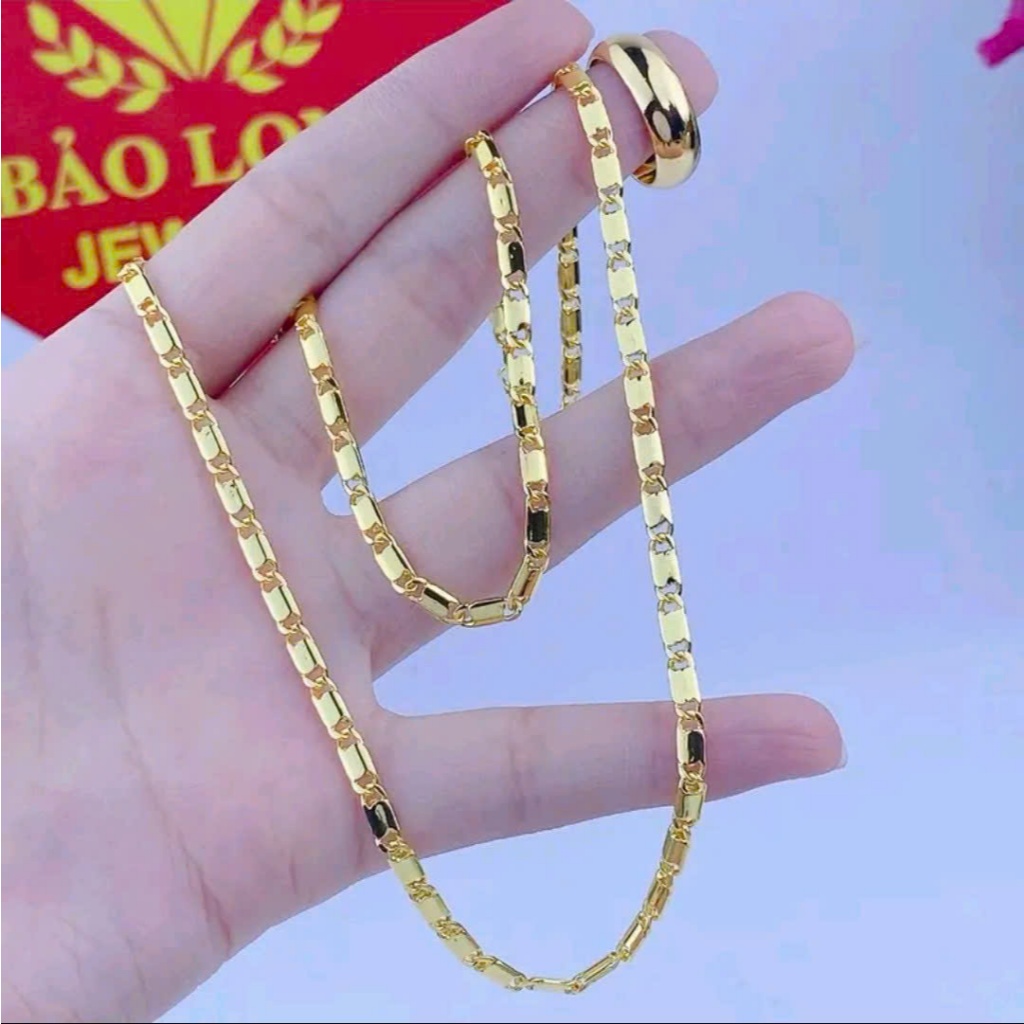 "Bộ dây chuyền ống trơn nam nữ kèm nhẫn trơn 2 chỉ mạ vàng, biểu tượng bền đẹp, sang trọng."