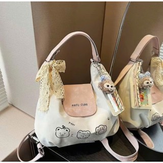  Túi đeo vai đeo chéo balo nữ họa tiết hoạt hình ngọt ngào phối dây nơ kèm charm thời trang - HT123 