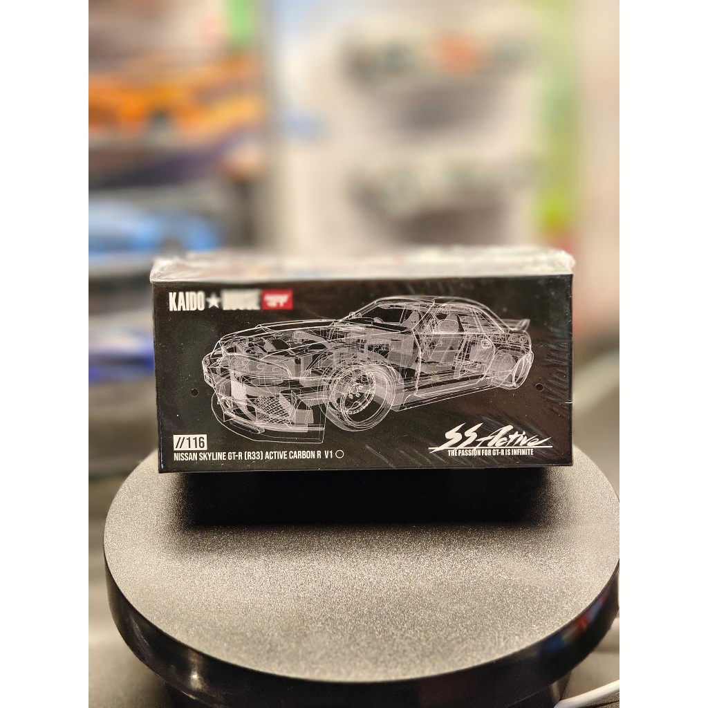 Xe mô hình Kaido House 116 Nissan Skyline GTR (R33) Active Carbon R V1 MiniGT