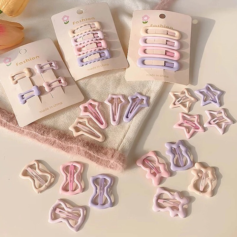 Bộ 32 kẹp tóc pastel đa dạng, xinh xắn cho bé, giúp tạo kiểu tóc mái đáng yêu và dễ thương.