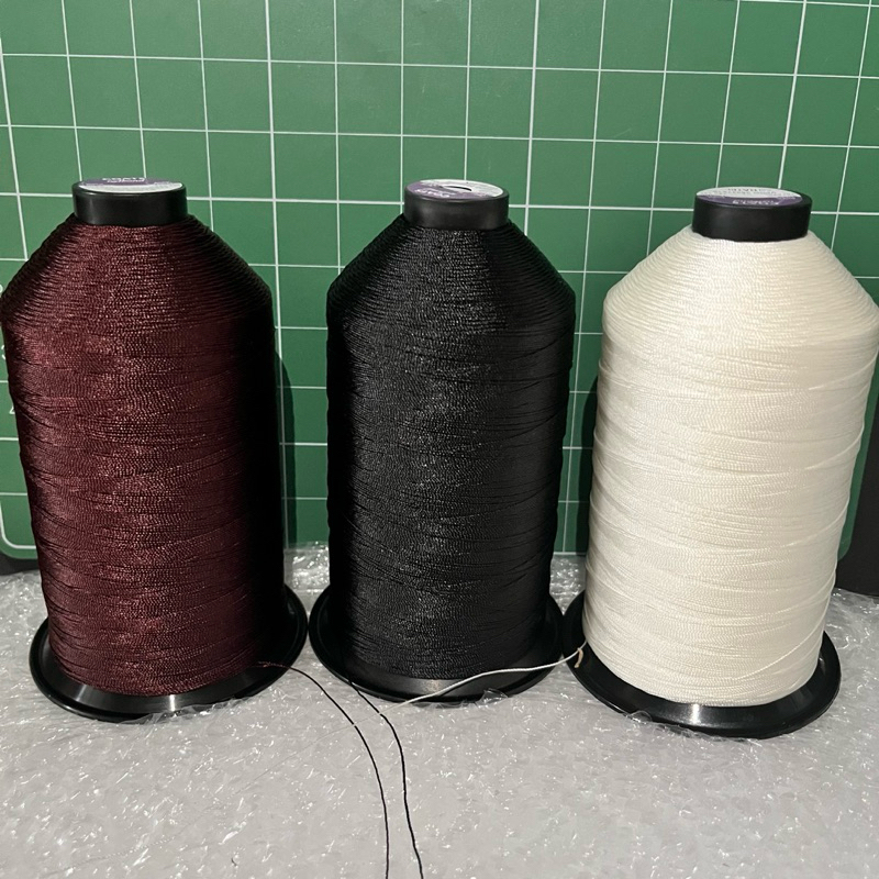 Chỉ nylon keo ,tex 135 kích thước sợi 0,6mm,một cuộn dài 1500m ,may đè ,may ghế sofa