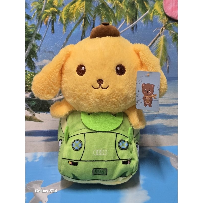 Gấu bông bánh plan ngồi xe