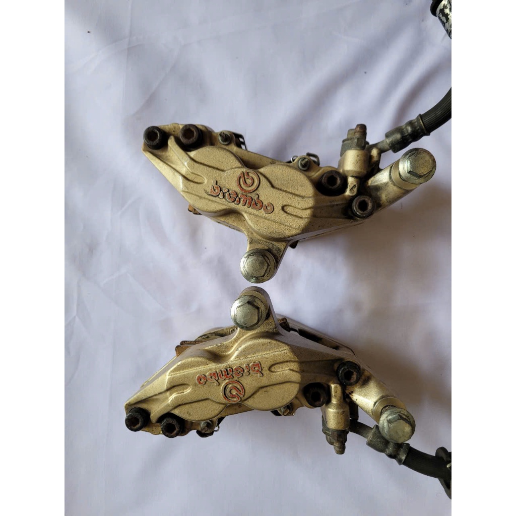 Heo Brembo 4 pis Heo dầu trước Củ thắng trước xe phân khối lớn zin Thương hiệu Brembo Ý Chân 100mm